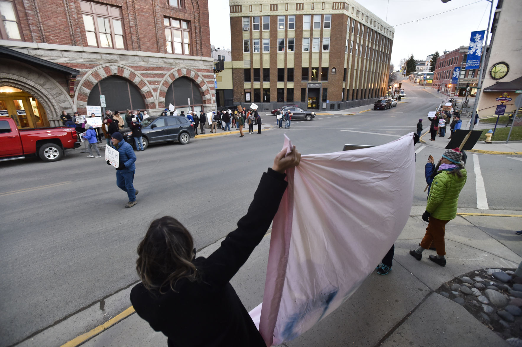 Protesters demonstrate outside the Montana Club